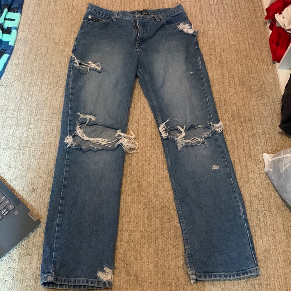 Size 8 ripped jeans. no tag so i have no idea where they came from